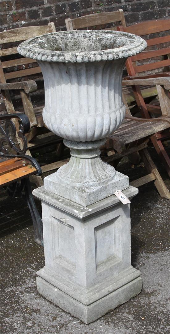 Stonework urn and stand